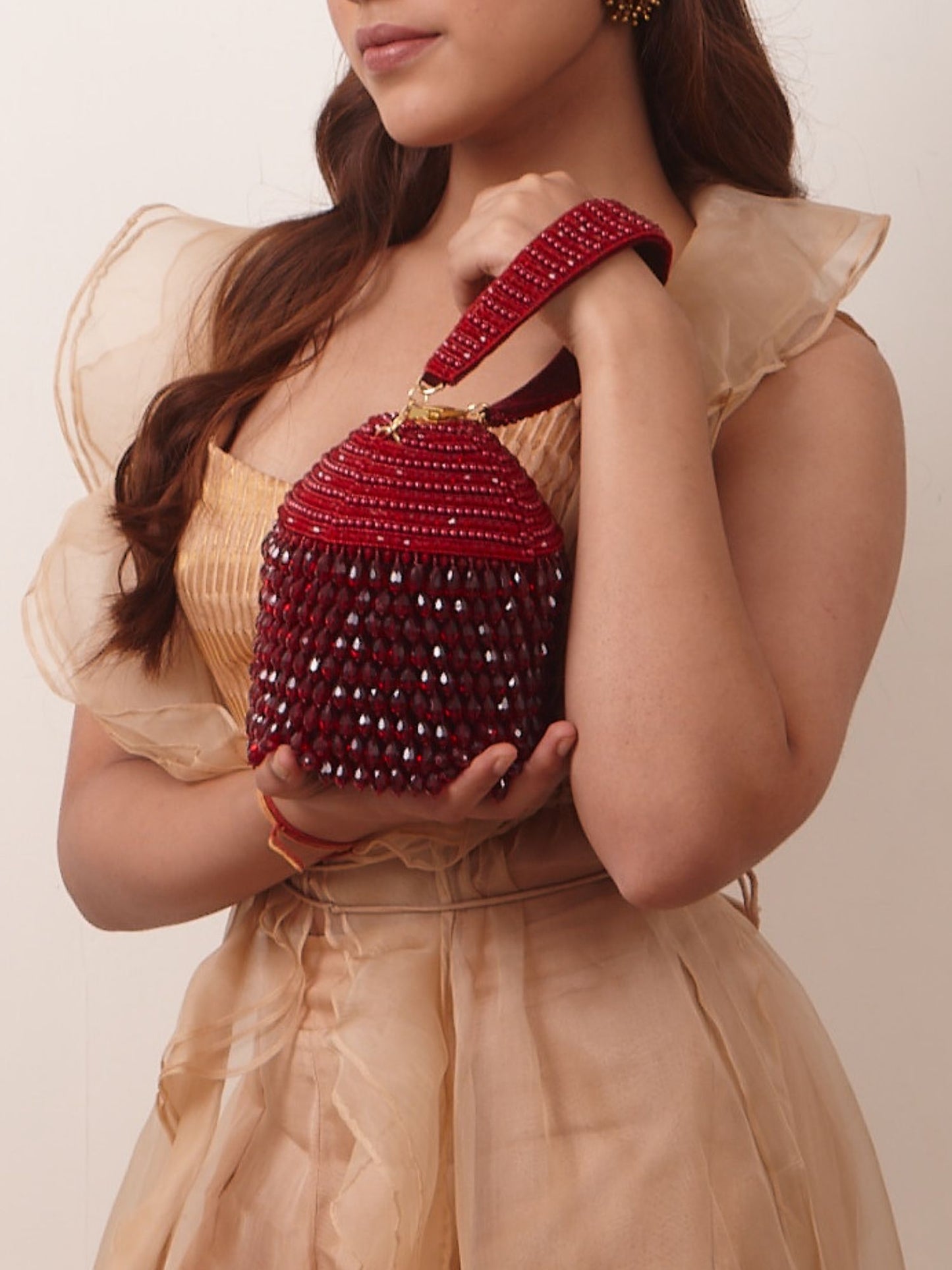 Trishala in our Red Starry Roohi Bucket Bag