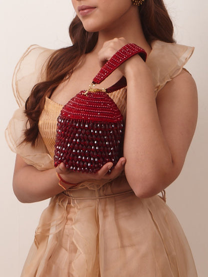 Trishala in our Red Starry Roohi Bucket Bag