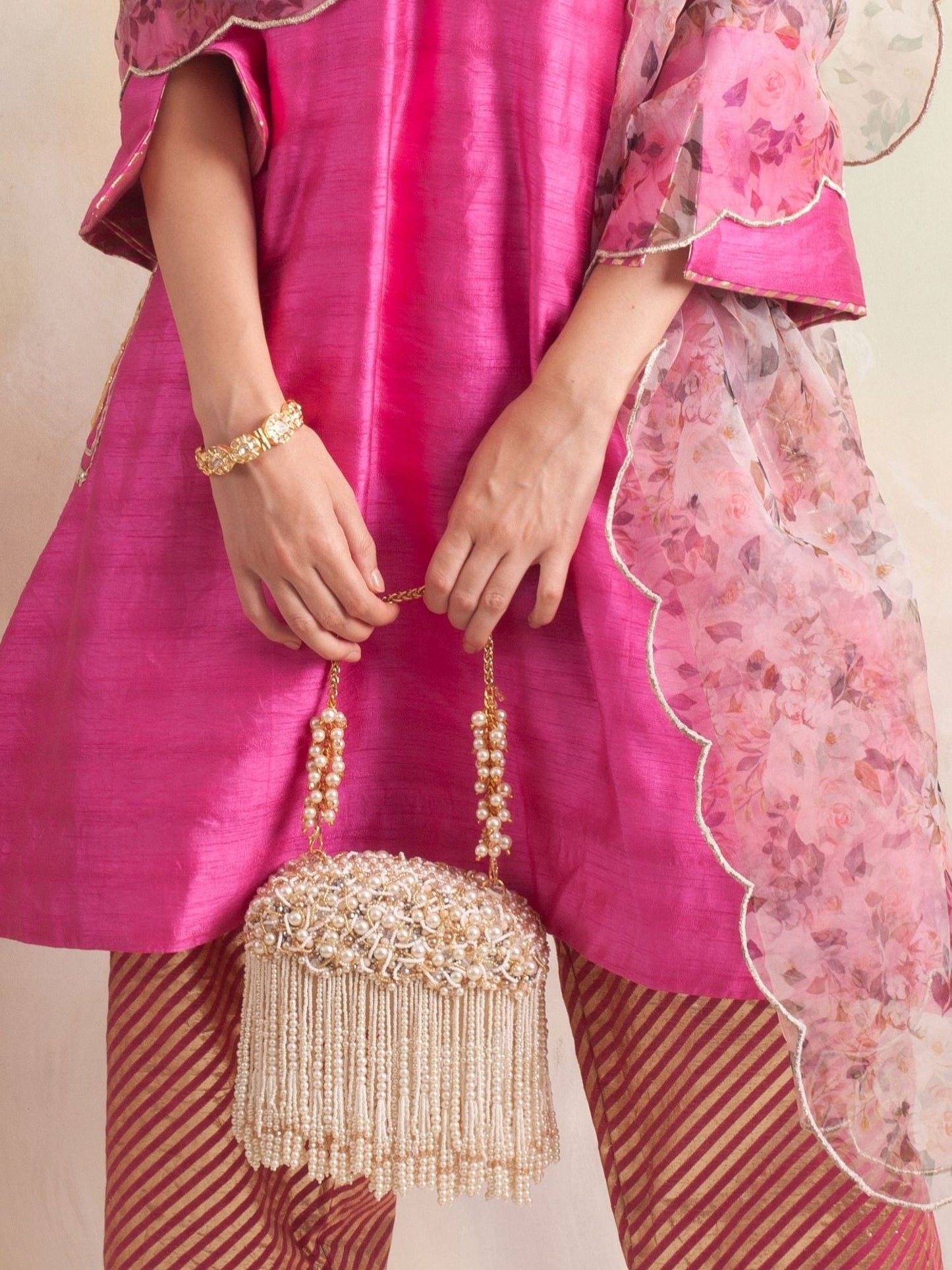 Zuri Oval Clutch - With Tassels