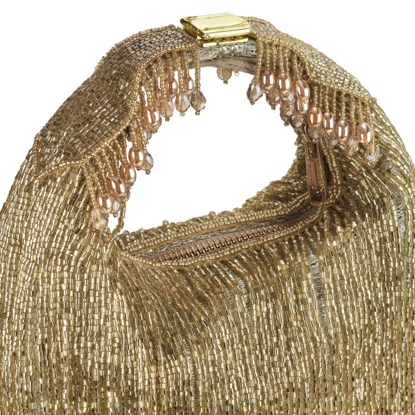 Tarini in our Golden Embellished Zaha Tasselled Cutdana Bag