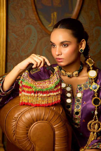Ankita Arora In our Faiza Boat Bag -Golden Red
