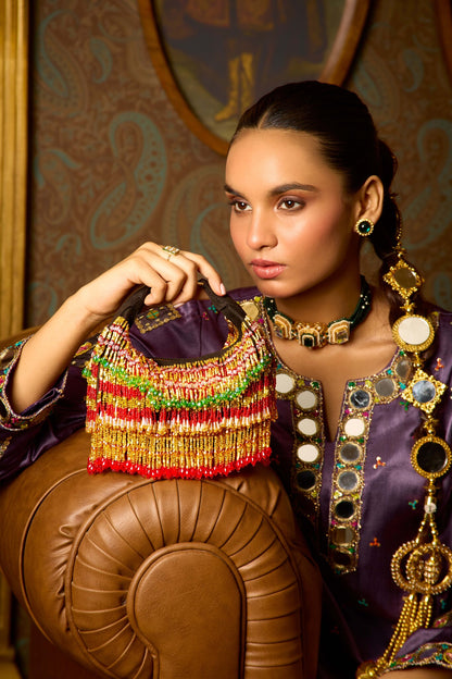 Ankita Arora In our Faiza Boat Bag -Golden Red