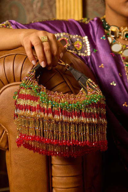 Ankita Arora In our Faiza Boat Bag -Golden Red