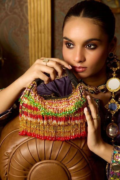 Ankita Arora In our Faiza Boat Bag -Golden Red