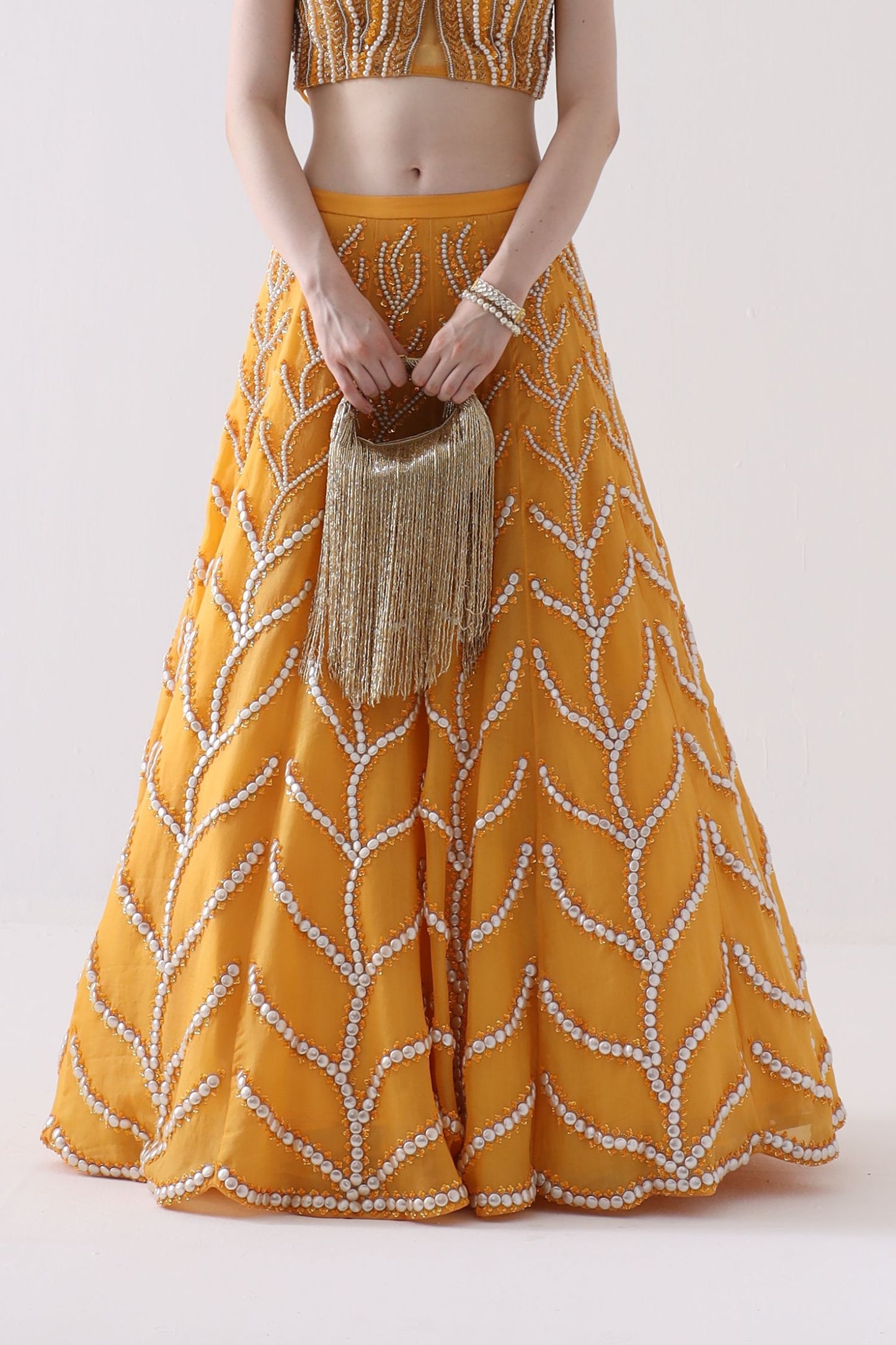 Golden Embellished Zaha Tasselled Cutdana Bag