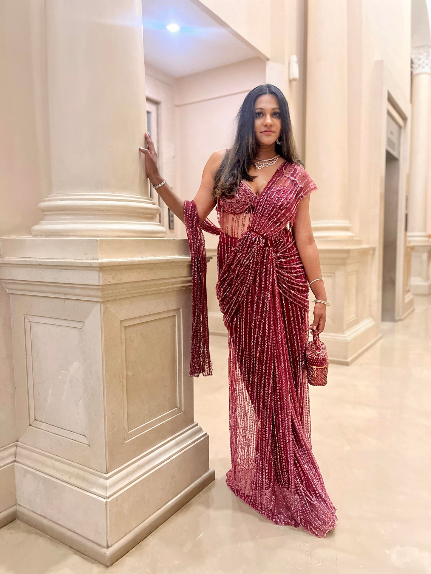 Esha Amiin in our Laura Pearl Red Cube Bag