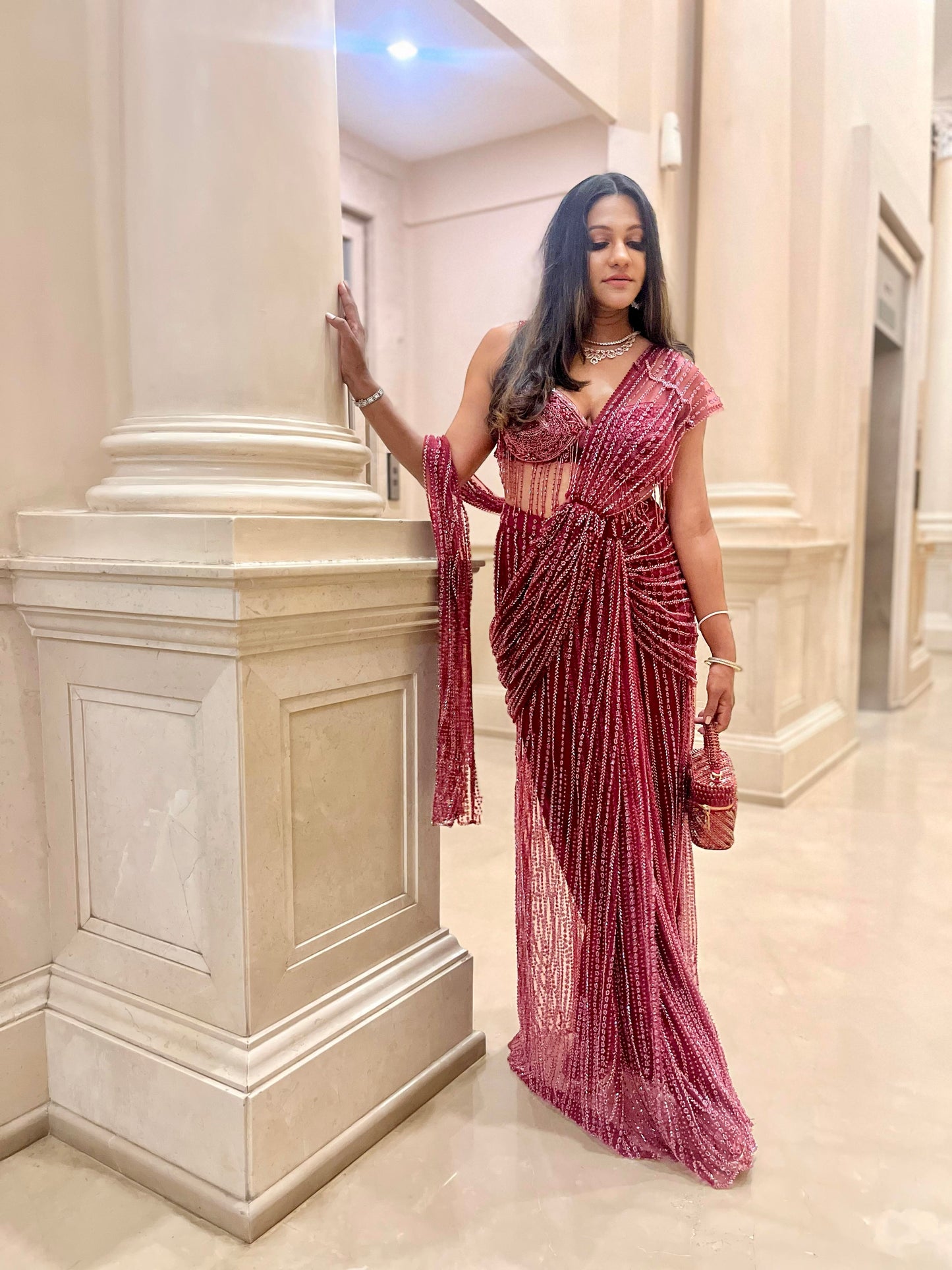 Esha Amiin in our Laura Pearl Red Cube Bag