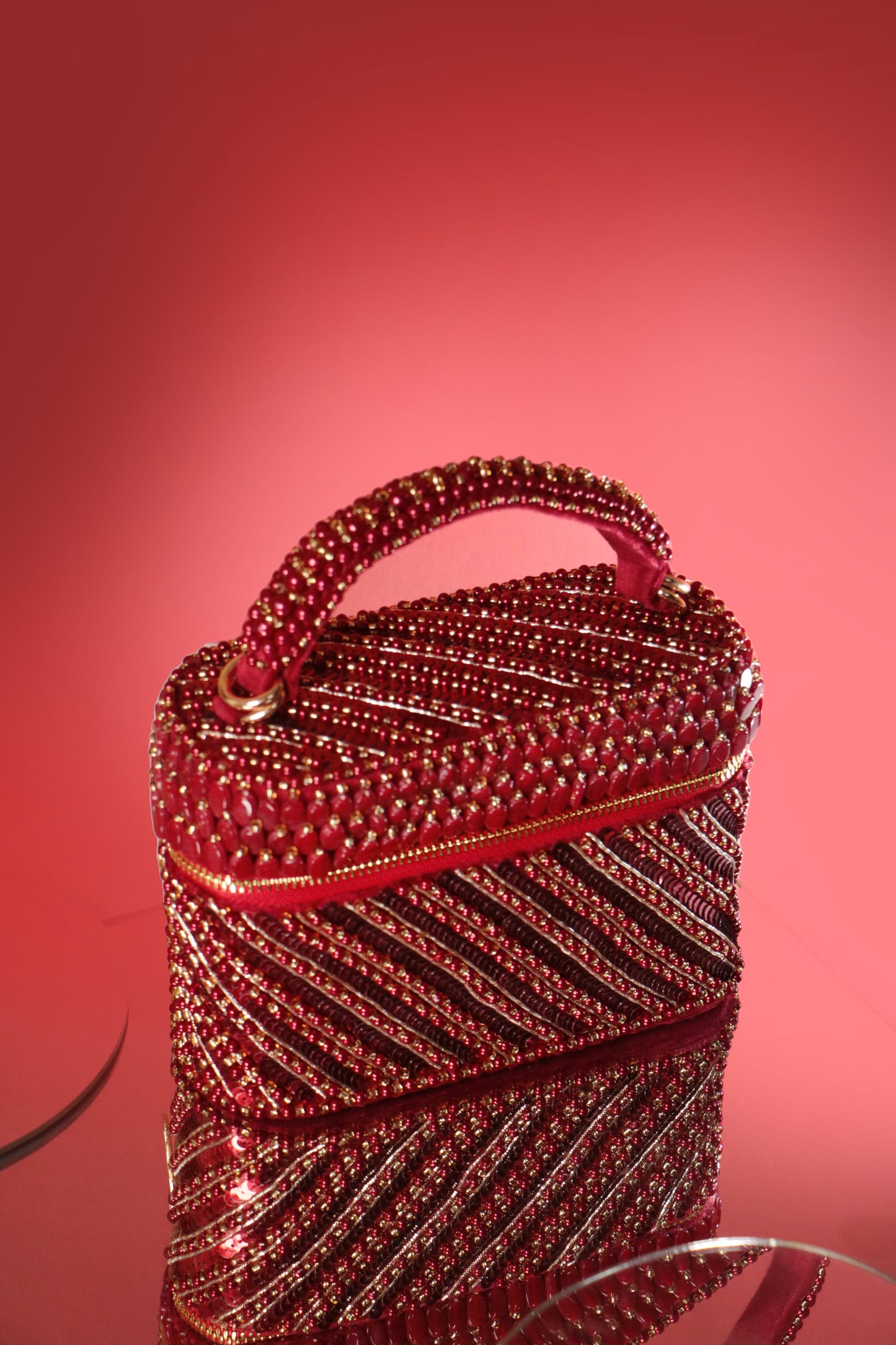 Esha Amiin in our Laura Pearl Red Cube Bag