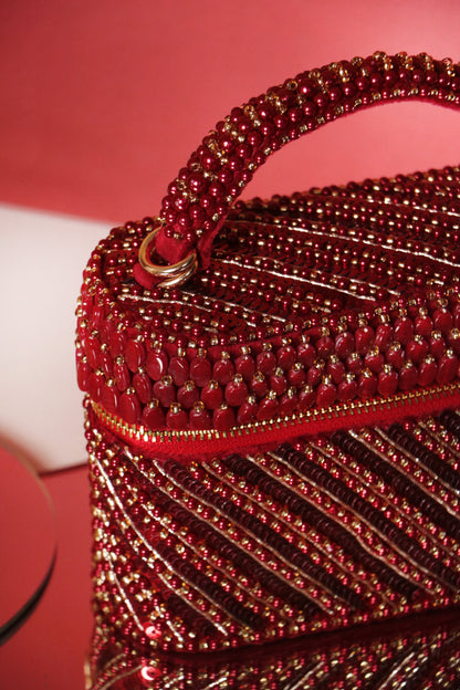 Esha Amiin in our Laura Pearl Red Cube Bag