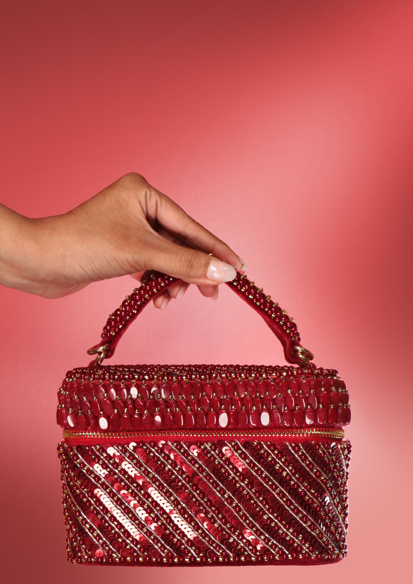 Esha Amiin in our Laura Pearl Red Cube Bag