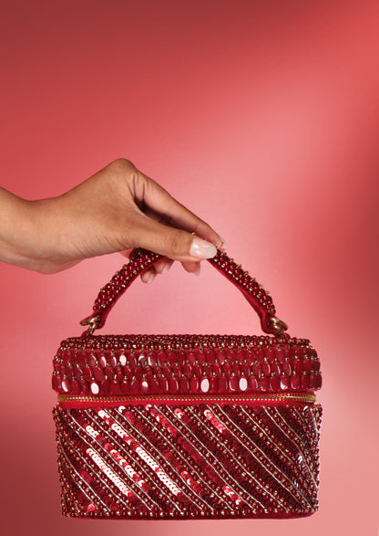 Esha Amiin in our Laura Pearl Red Cube Bag