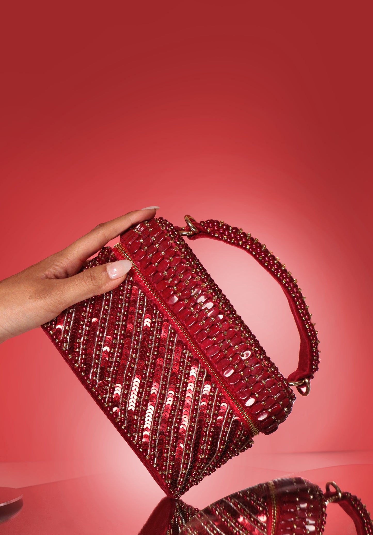 Esha Amiin in our Laura Pearl Red Cube Bag