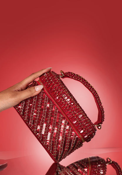 Esha Amiin in our Laura Pearl Red Cube Bag