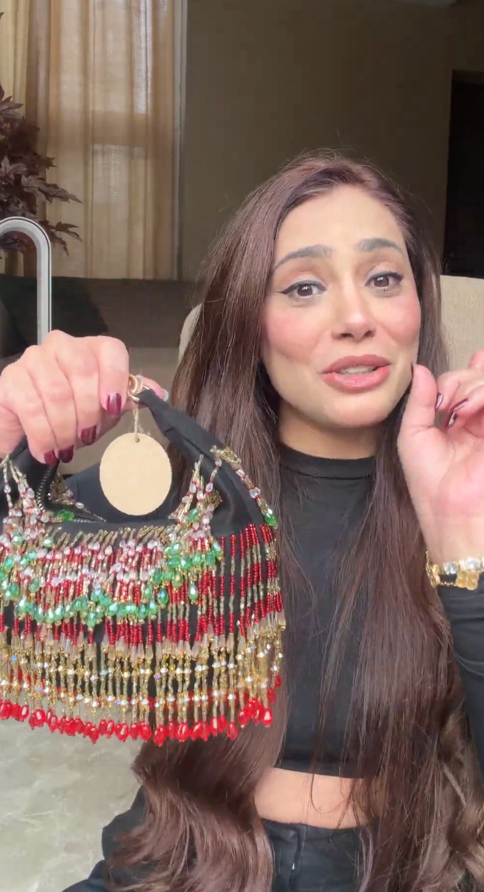 Ankita Arora In our Faiza Boat Bag -Golden Red